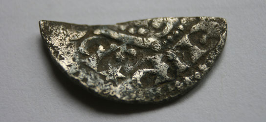 A cut half silver penny of Henry 111 dating to 1216 to 1272AD